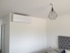 Mitsubishi Electric A/c Systems into Residential Extension Top Wall